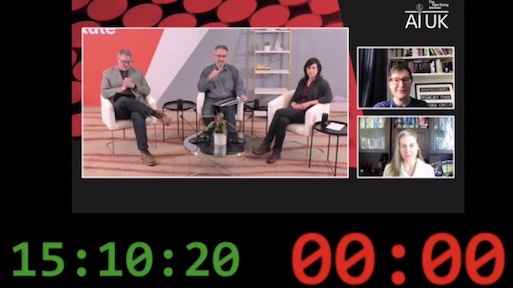 Screenshot of Zoom view from the conference stage with a large green clock and red countdown timer
